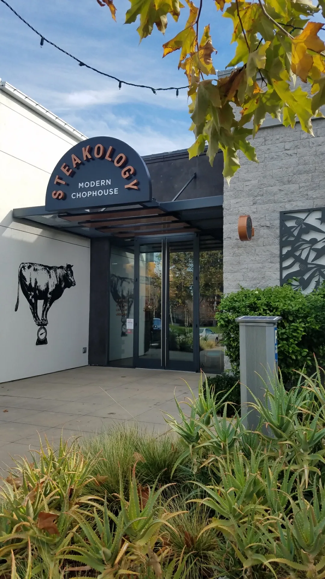 Commercial monument sign in a landscaped setting